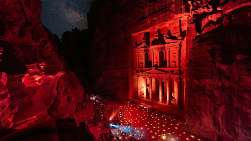 Petra at night with red lights