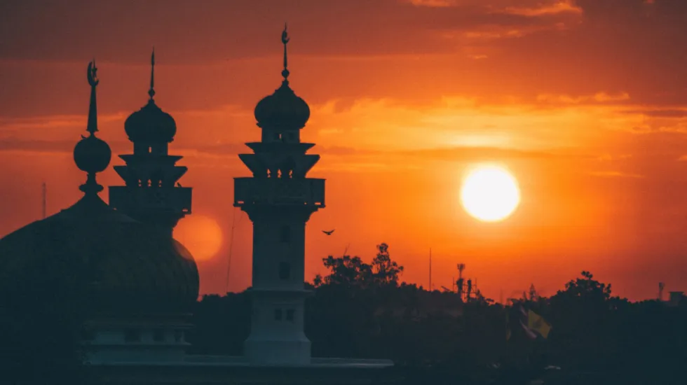 Islamic mosque during sunrise