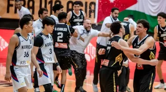 Jordan's basketball team celebrating a victory